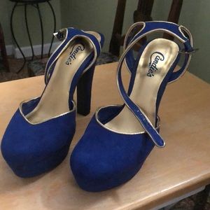 Blue and gold pumps